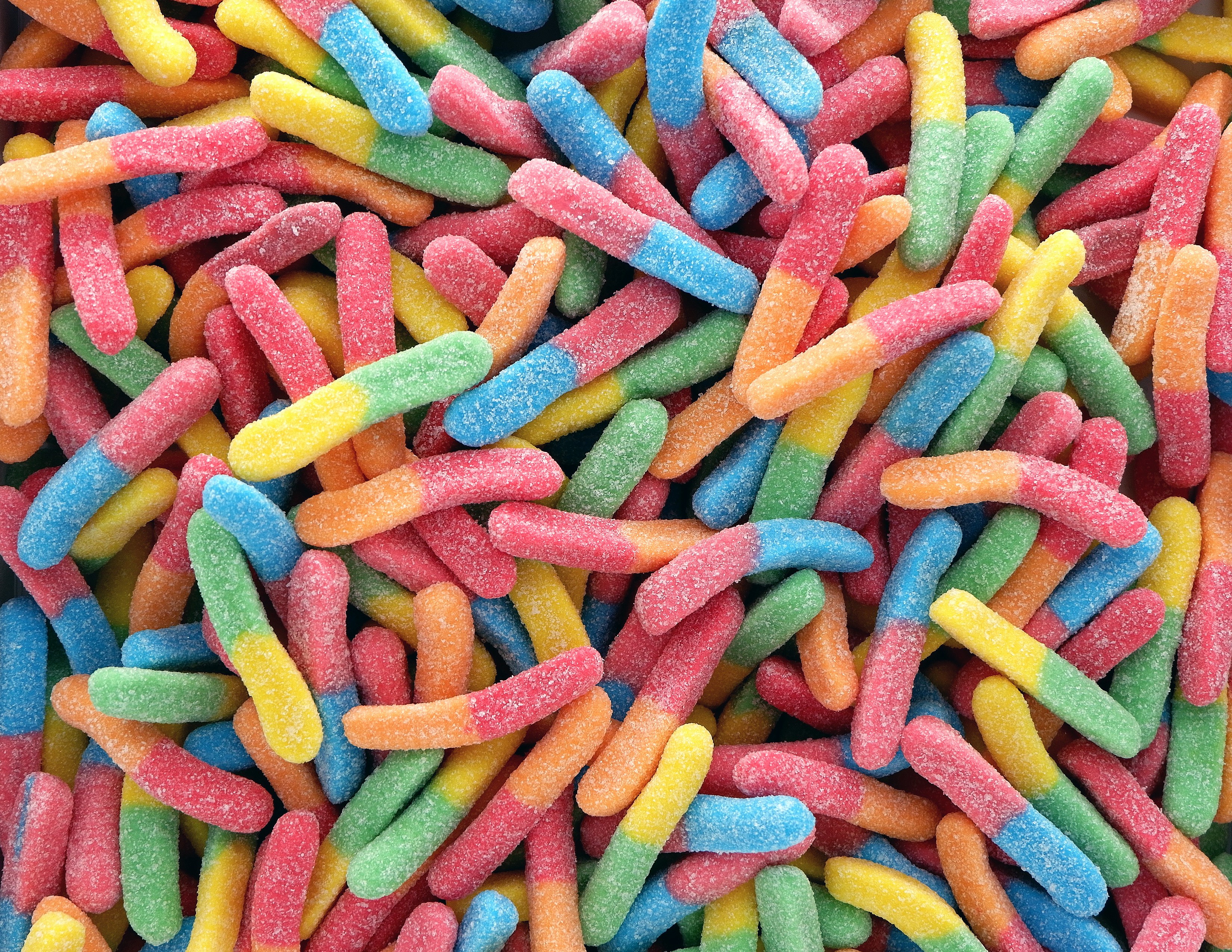 A close-up of sour worm candy | Source: Unsplash